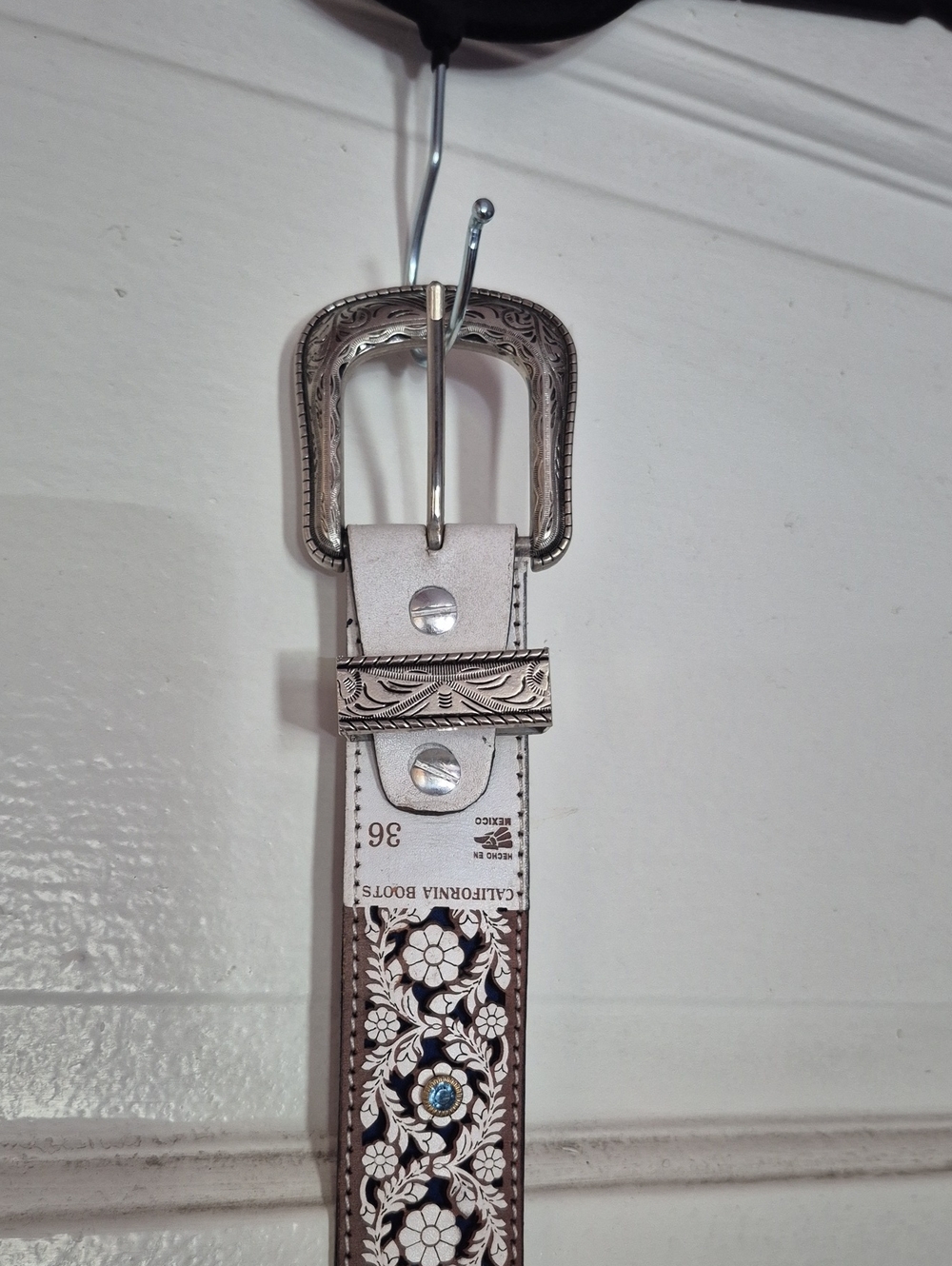 White Floral Tooled Belt with Silver Buckle